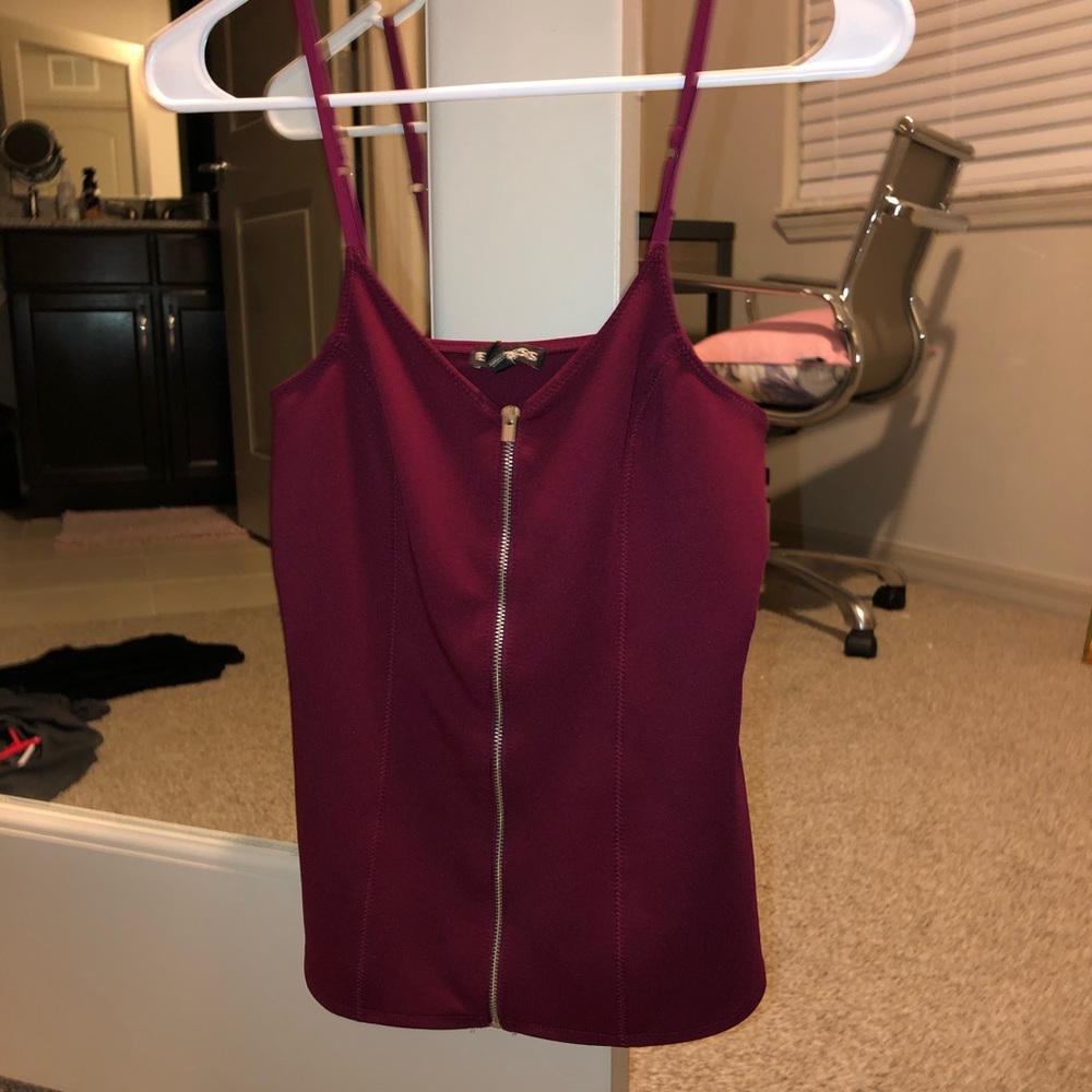 Maroon/burgundy tank top. Zips all the way down.
